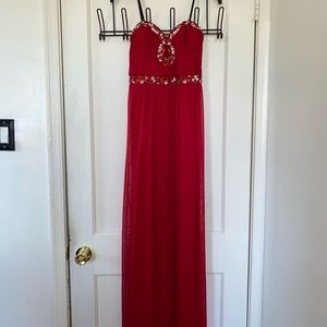 Beautiful red strapless gown with diamond accents!